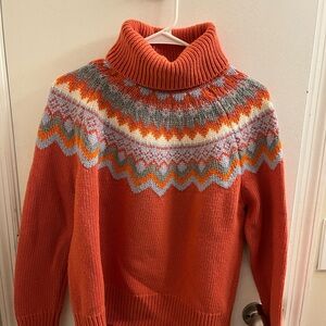 Cozy Orange Knit Sweater with Patterned Design